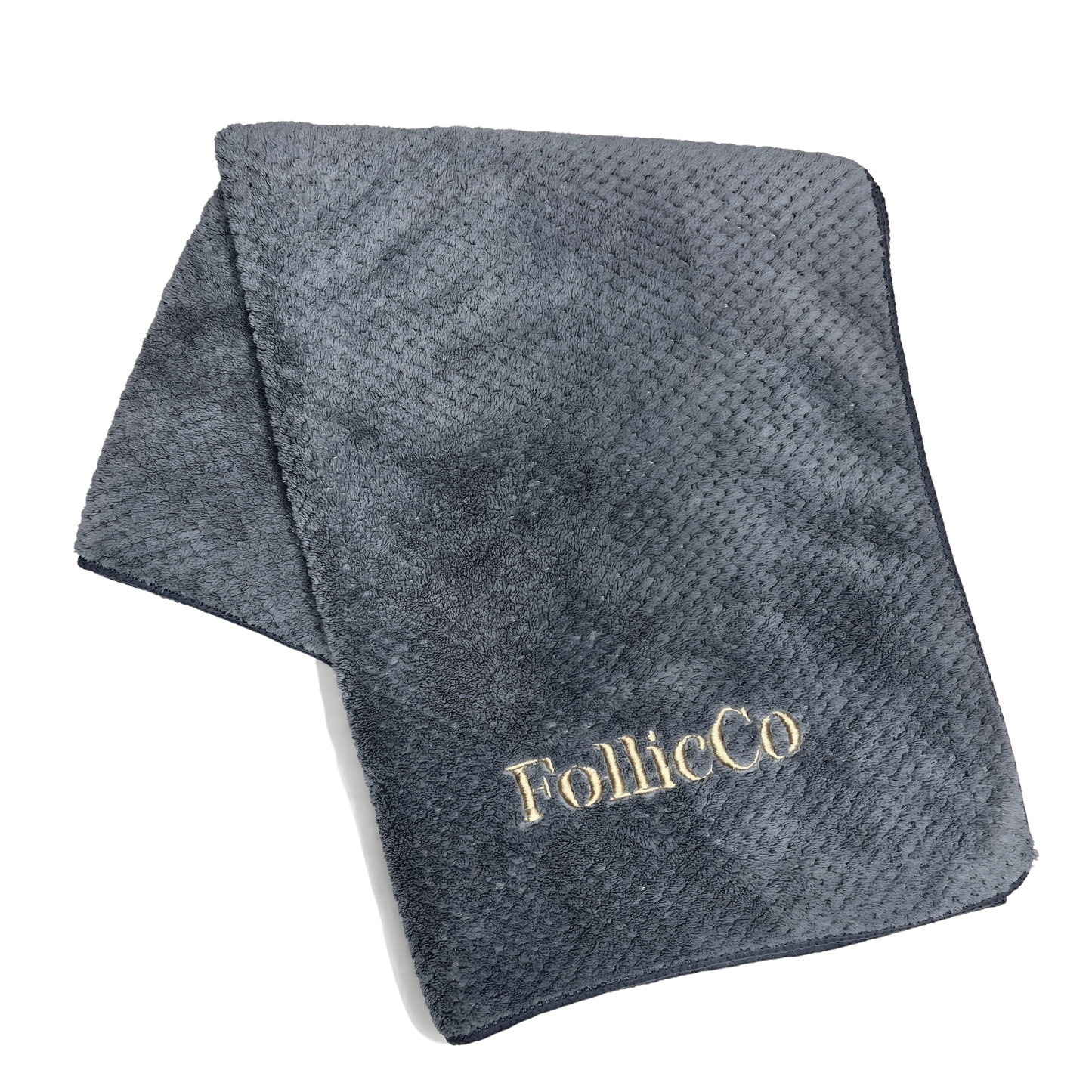FollicCo Microfibre Towel Laying on White Backdrop