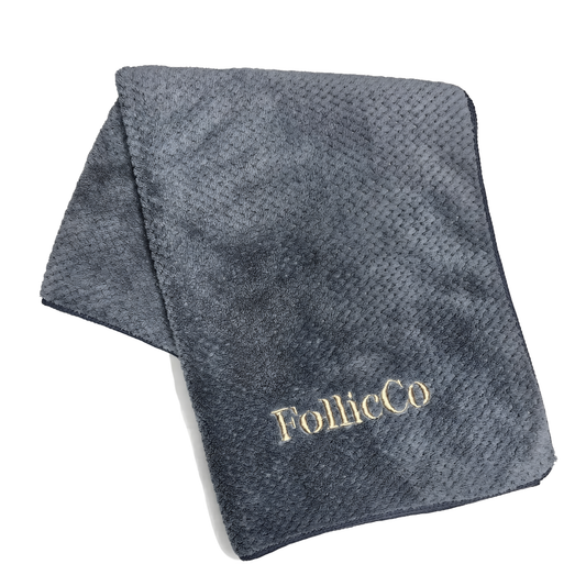 FollicCo Microfibre Towel Laying on White Backdrop